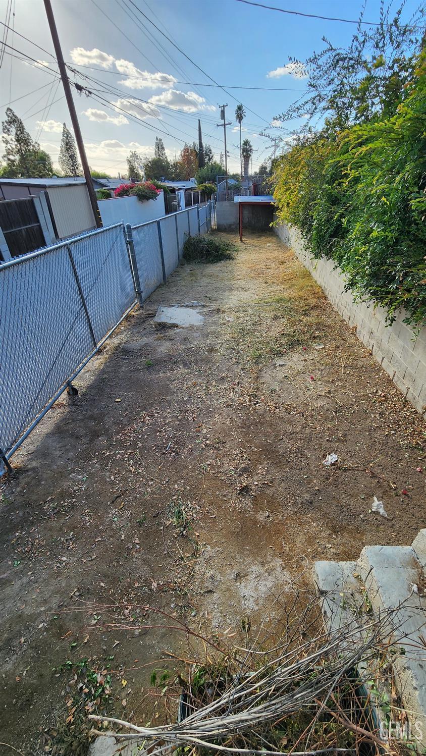 Undisclosed Address Bakersfield, CA 93306 - Photo 3 of 22 a view of a backyard