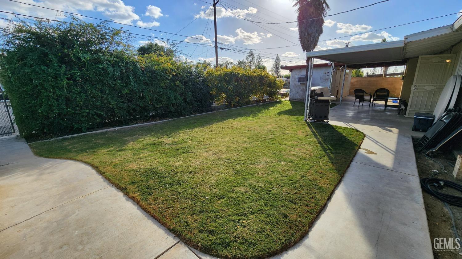Undisclosed Address Bakersfield, CA 93306 - Photo 4 of 22 a view of a swimming pool with a patio