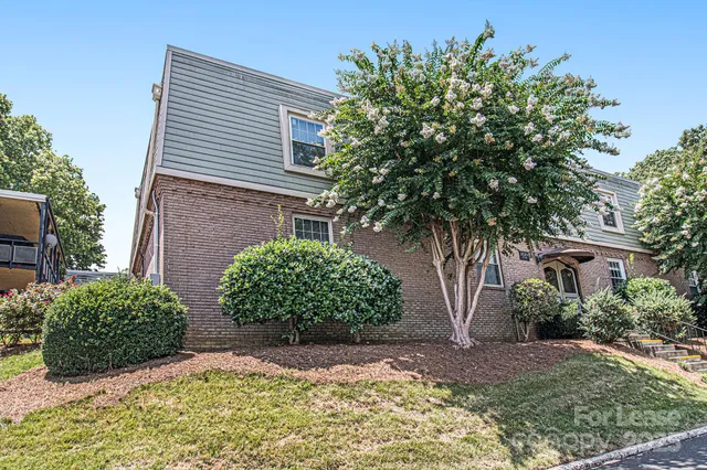 a view of a house with a street