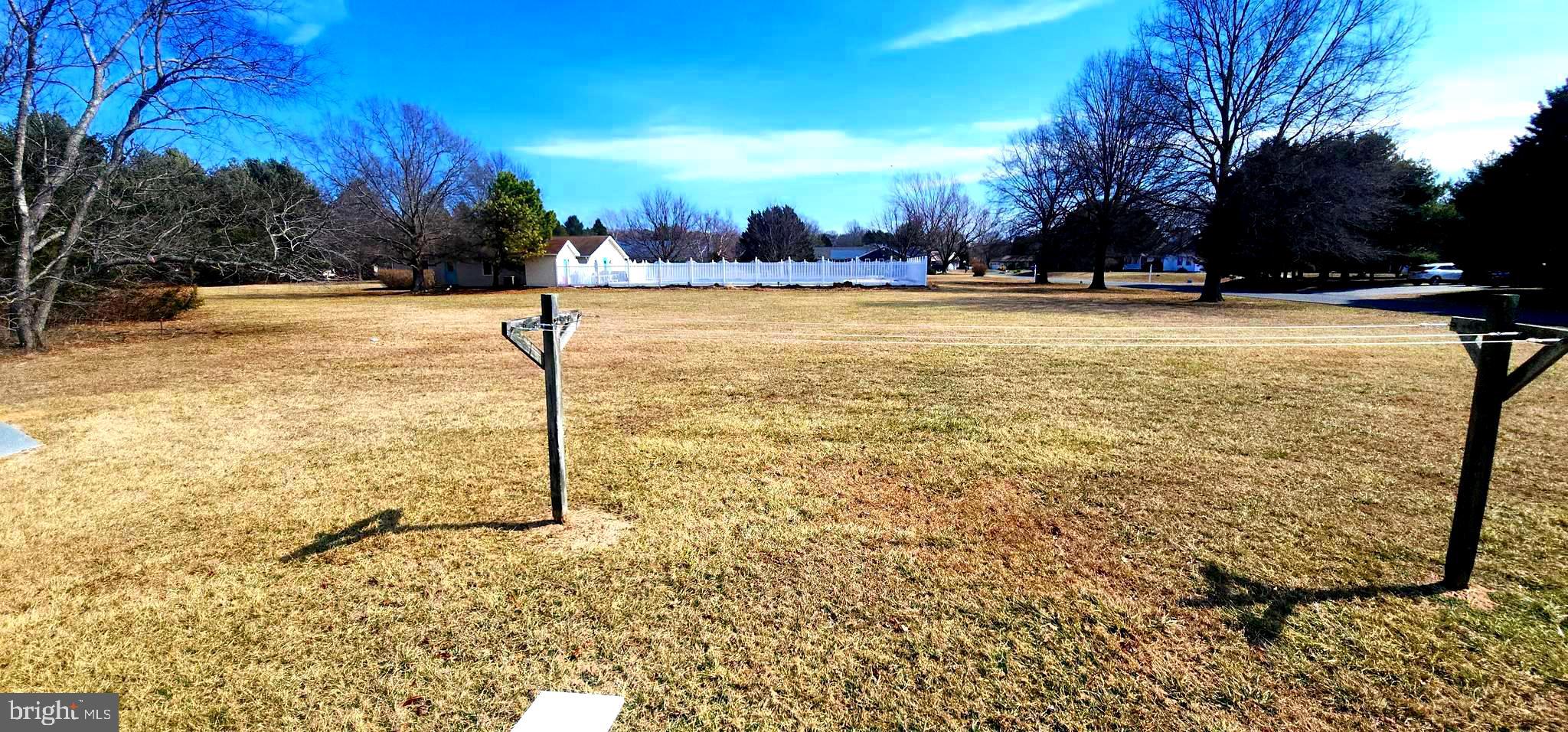 19773 Old Landing Road Rehoboth Beach, DE 19971 - Photo 17 of 54 a view of swimming pool with an outdoor space