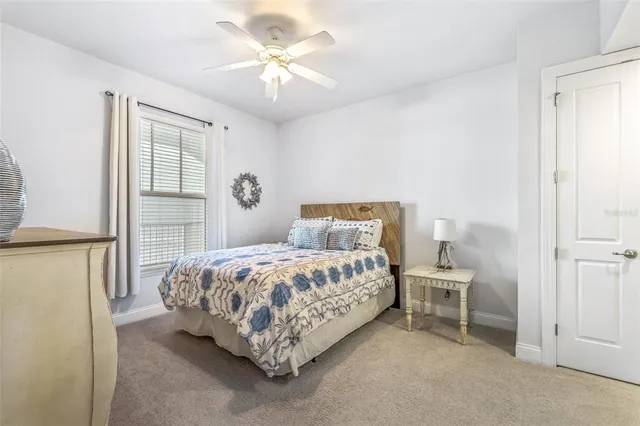 a view of a livingroom with furniture and furniture