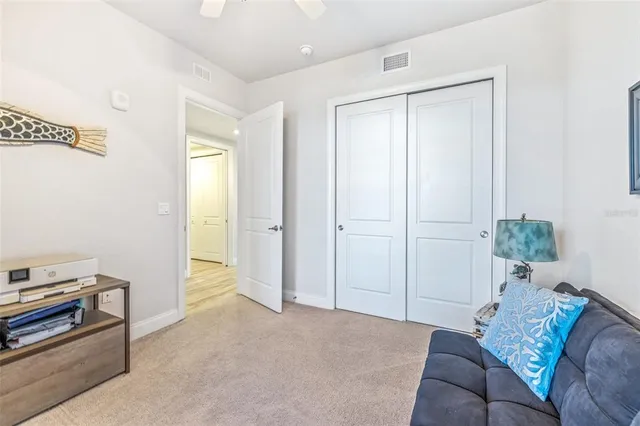 a view of a building with a yard