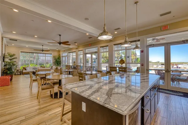 a view of a balcony with wooden floor and fence