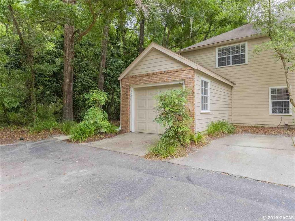 front view of a house and a yard