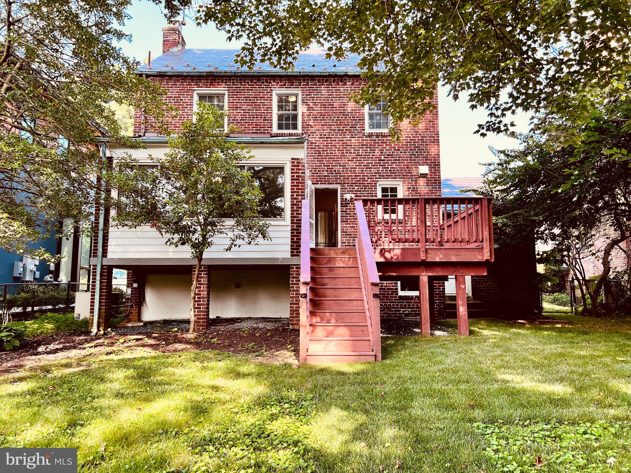 7208 Exeter Road Bethesda, MD 20814 - Photo 12 of 26 front view of a house with a yard