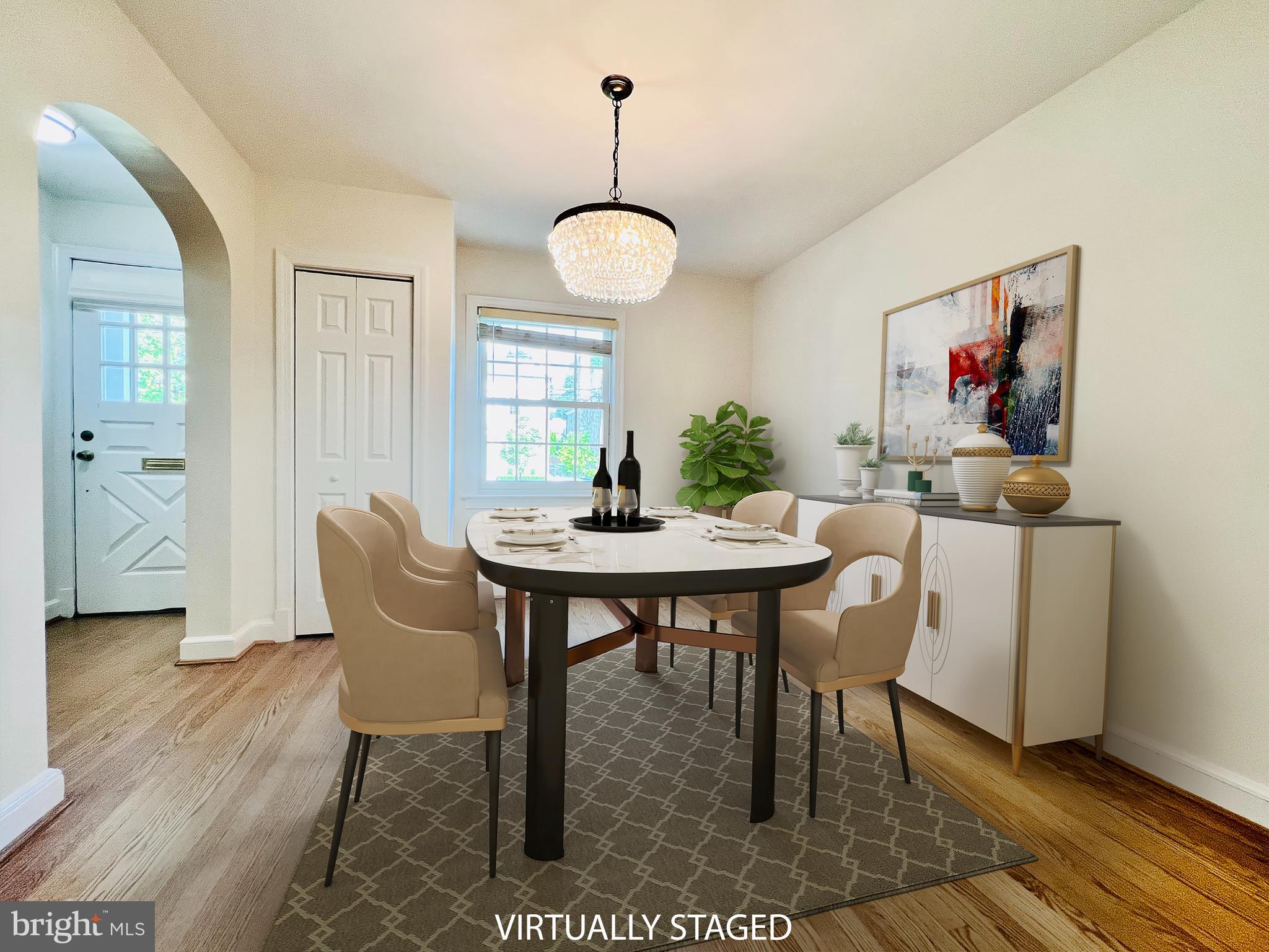 7208 Exeter Road Bethesda, MD 20814 - Photo 5 of 26 a view of a dining room with furniture and wooden floor