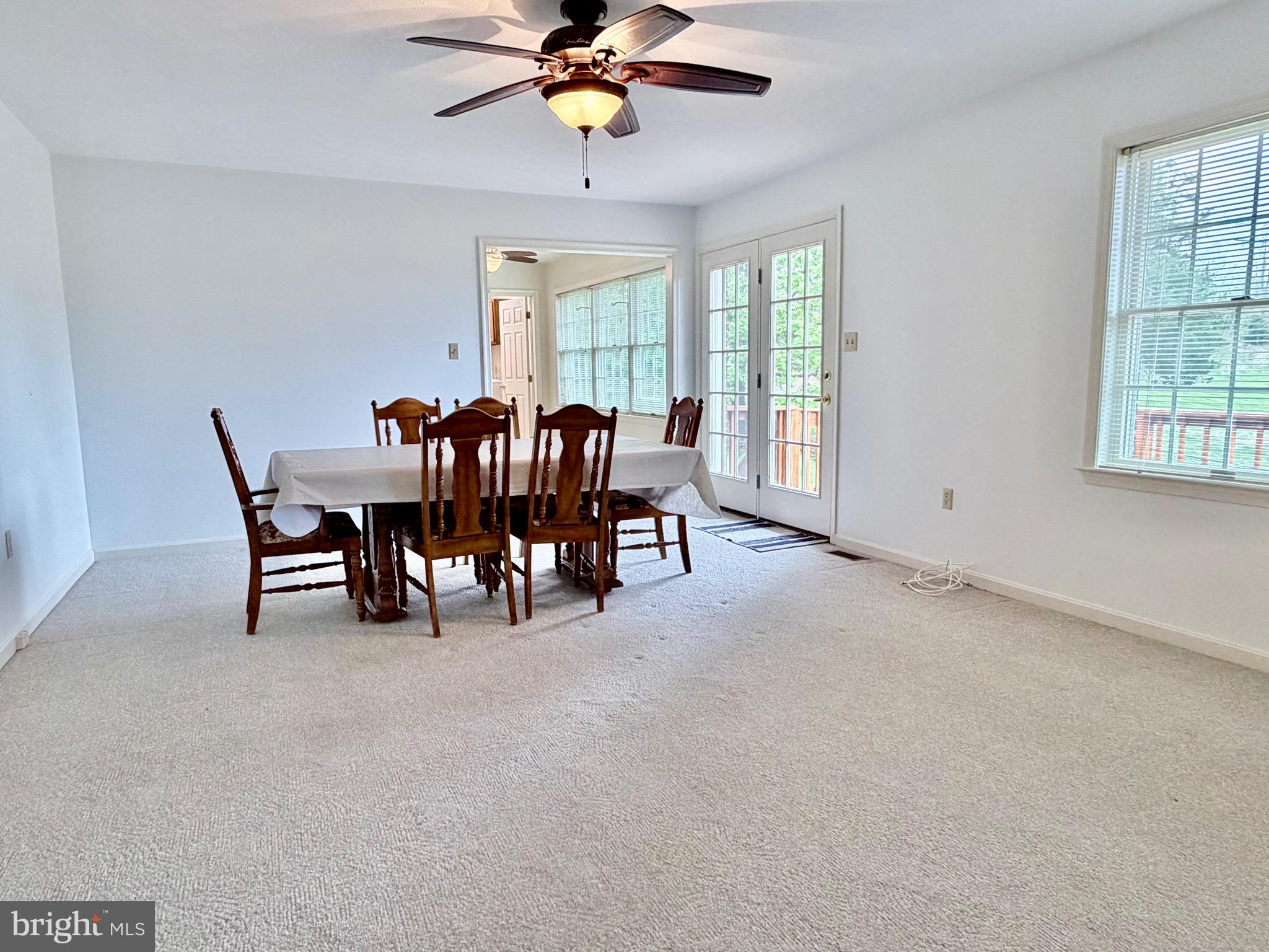 78 Brook Creek Road Toms Brook, VA 22660 - Photo 15 of 43 a view of a livingroom with furniture and chandelier