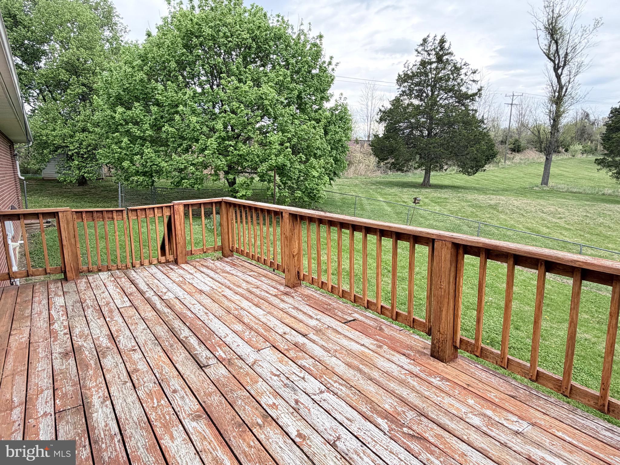 78 Brook Creek Road Toms Brook, VA 22660 - Photo 17 of 43 a balcony with view of trees in the background
