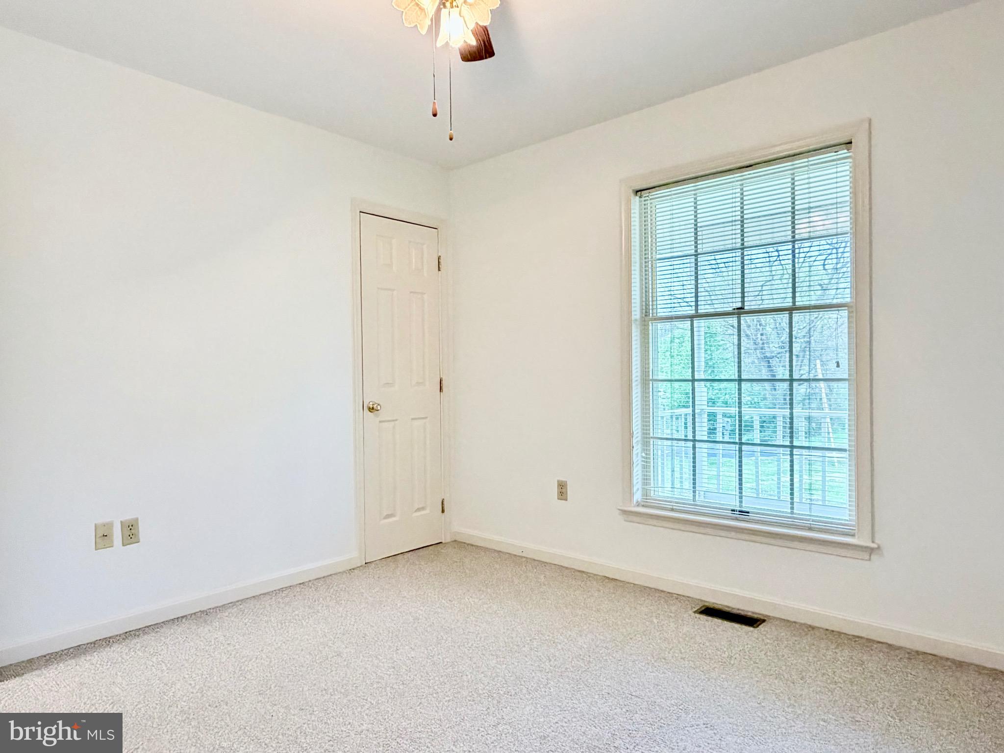 78 Brook Creek Road Toms Brook, VA 22660 - Photo 27 of 43 an empty room with a empty space and windows