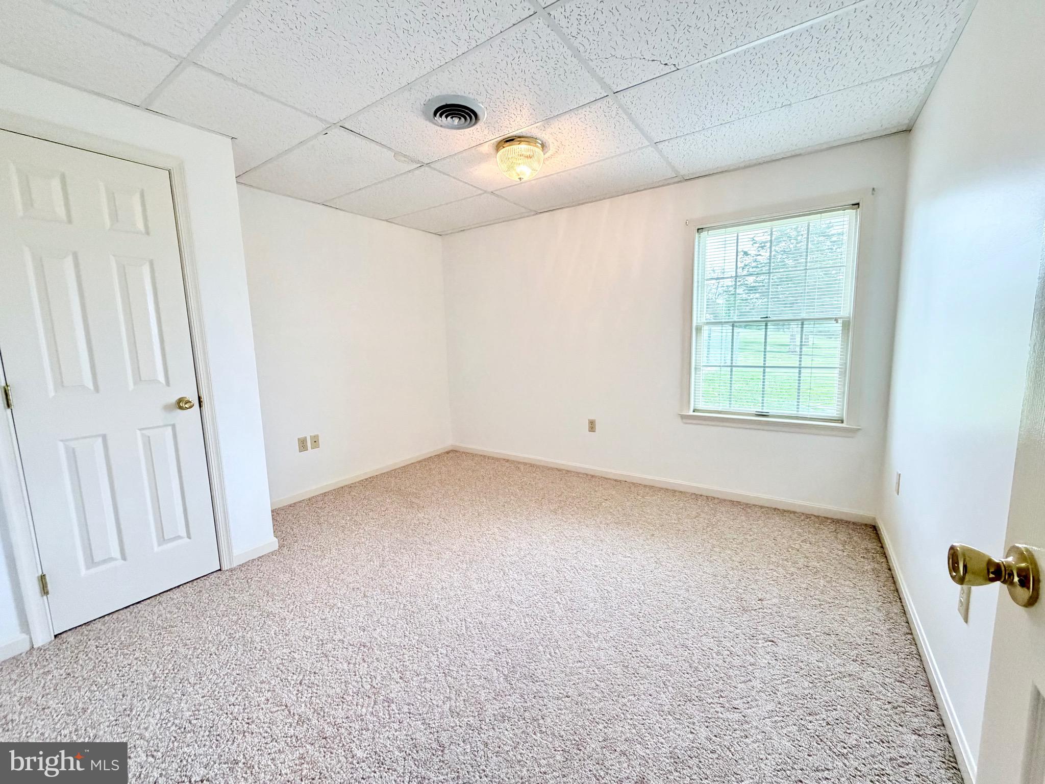 78 Brook Creek Road Toms Brook, VA 22660 - Photo 32 of 43 an empty room with windows