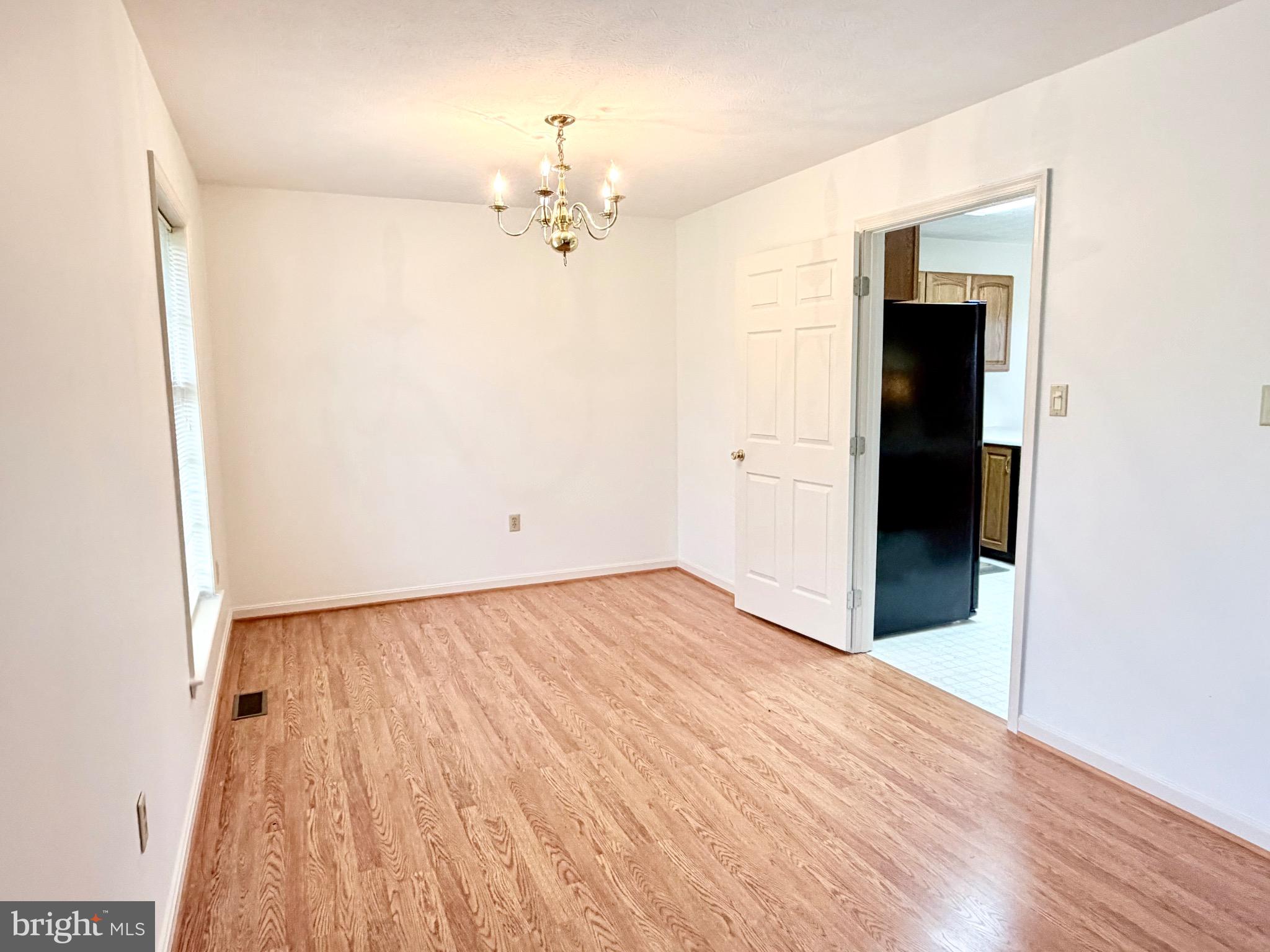 78 Brook Creek Road Toms Brook, VA 22660 - Photo 7 of 43 a view of an empty room with wooden floor