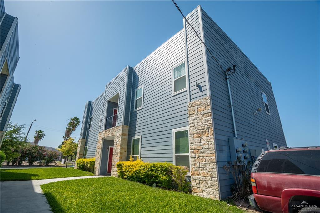 521 North Cynthia Street, Unit 2 McAllen, TX 78501 - Photo 20 of 21 a view of a house with a yard