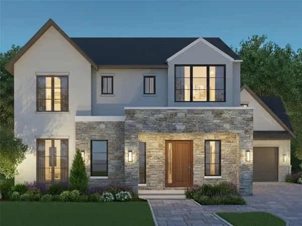 front view of a house with a yard