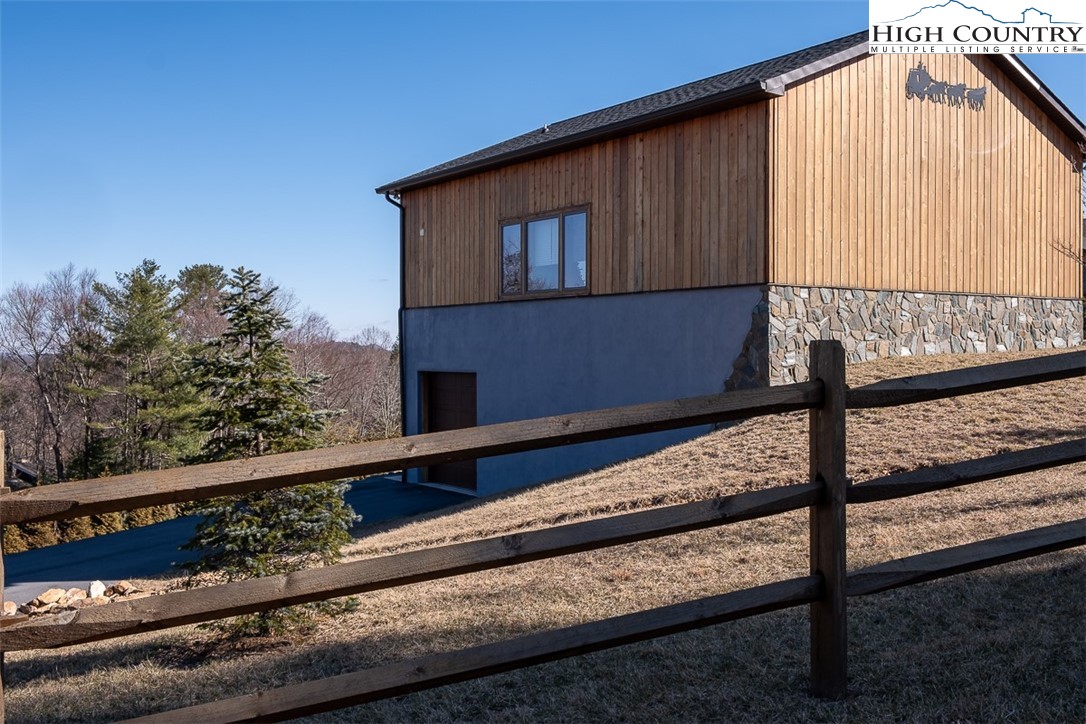 186 Woodcrest Road Glade Valley, NC 28627 - Photo 43 of 50 a house view with a street