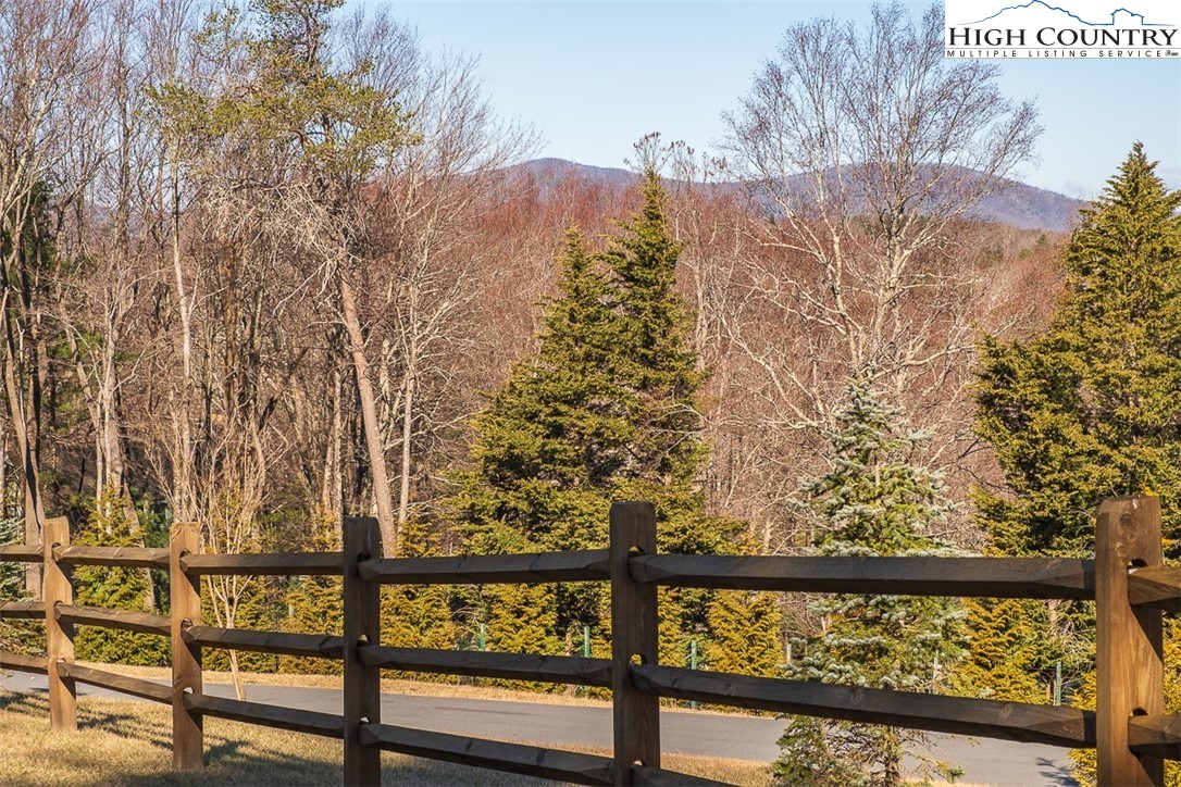 186 Woodcrest Road Glade Valley, NC 28627 - Photo 44 of 50 a view of a wooden fence and trees