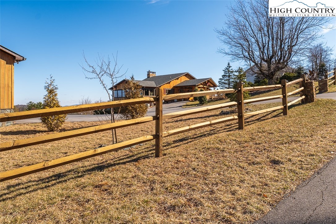 186 Woodcrest Road Glade Valley, NC 28627 - Photo 50 of 50 a view of a backyard with wooden fence
