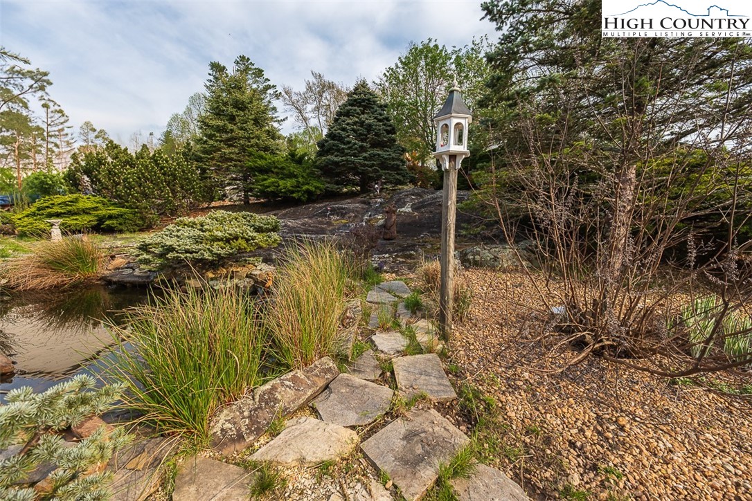 186 Woodcrest Road Glade Valley, NC 28627 - Photo 6 of 50 a view of a garden