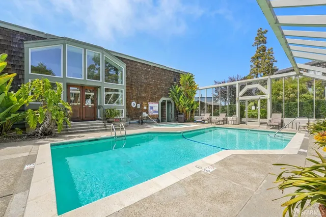 a view of a house with a swimming pool