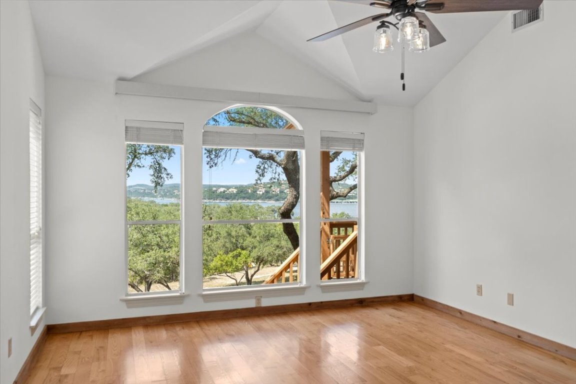 16808 Forest Way Austin, TX 78734 - Photo 15 of 33 wooden floor in an empty room with a window