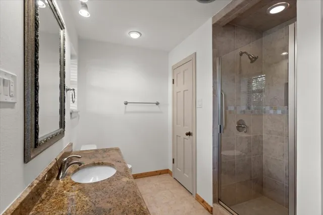 a view of a swimming pool with a porch