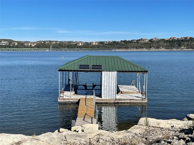 a view of a lake from a balcony
