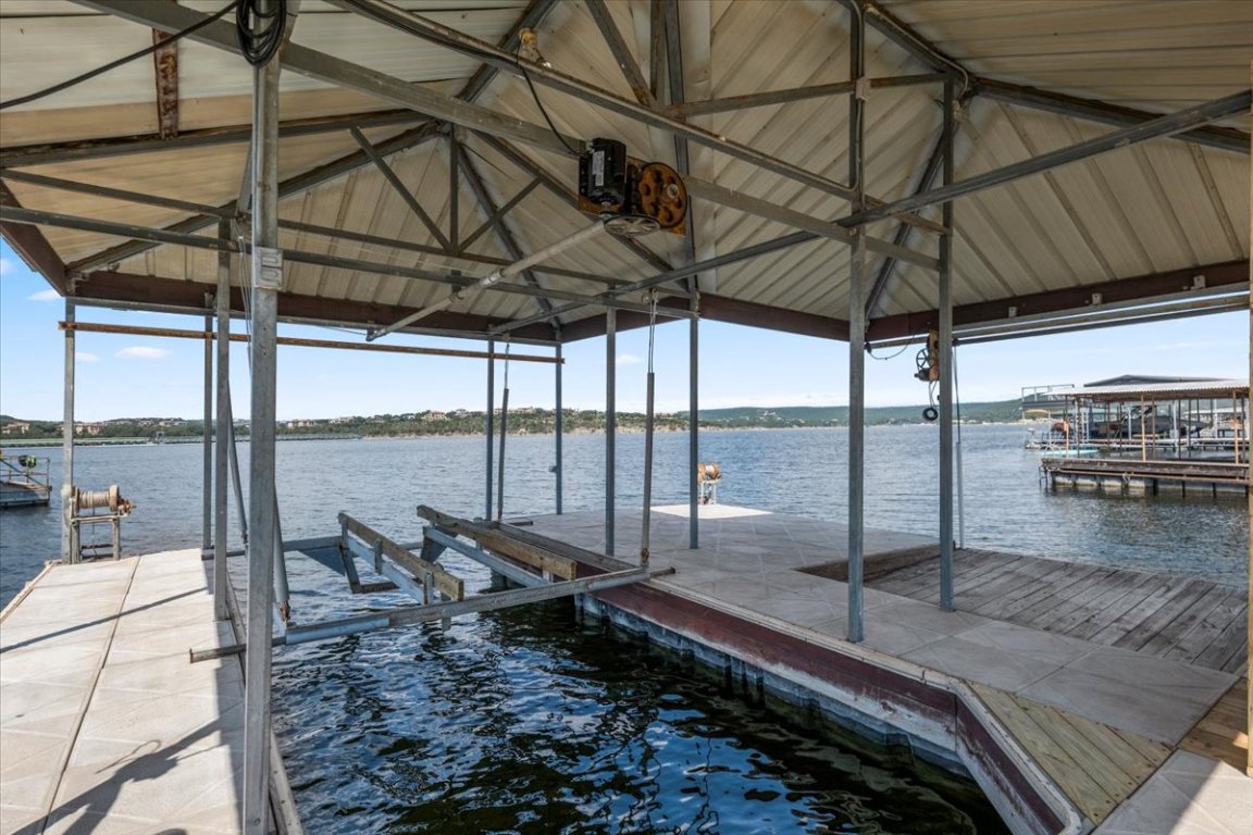 16808 Forest Way Austin, TX 78734 - Photo 27 of 33 a view of a swimming pool with a porch