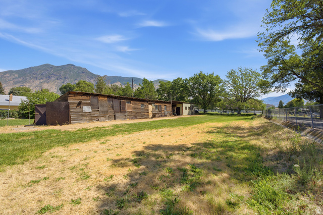 307 West 400 South Springville, UT 84663 - Photo 43 of 51 Expansive grassy lot with mature trees and mountain scenery