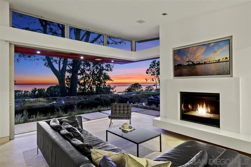 116 Nob Avenue Del Mar, CA 92014 - Photo 1 of 25 a living room with furniture and a fireplace