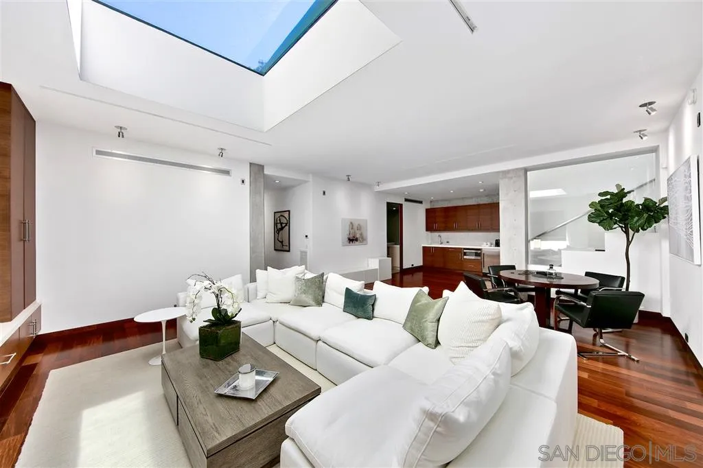 116 Nob Avenue Del Mar, CA 92014 - Photo 13 of 25 a living room with furniture potted plant and a window