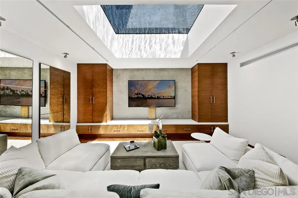 116 Nob Avenue Del Mar, CA 92014 - Photo 7 of 25 a living room with furniture and a flat screen tv