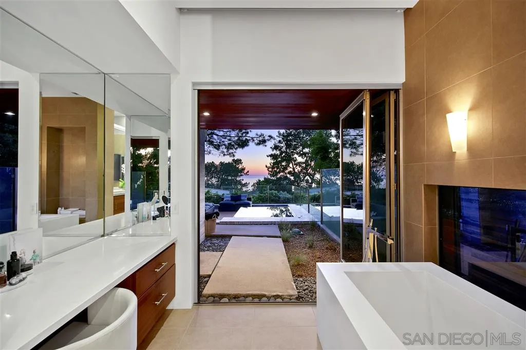 116 Nob Avenue Del Mar, CA 92014 - Photo 9 of 25 a large white kitchen with a large window