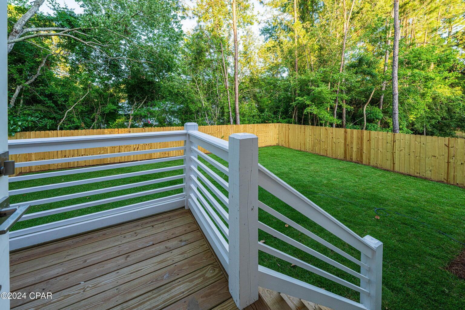 142 7th Street Santa Rosa Beach, FL 32459 - Photo 6 of 22 a view of outdoor space and deck