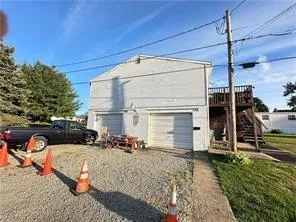 a view of a back yard of the house