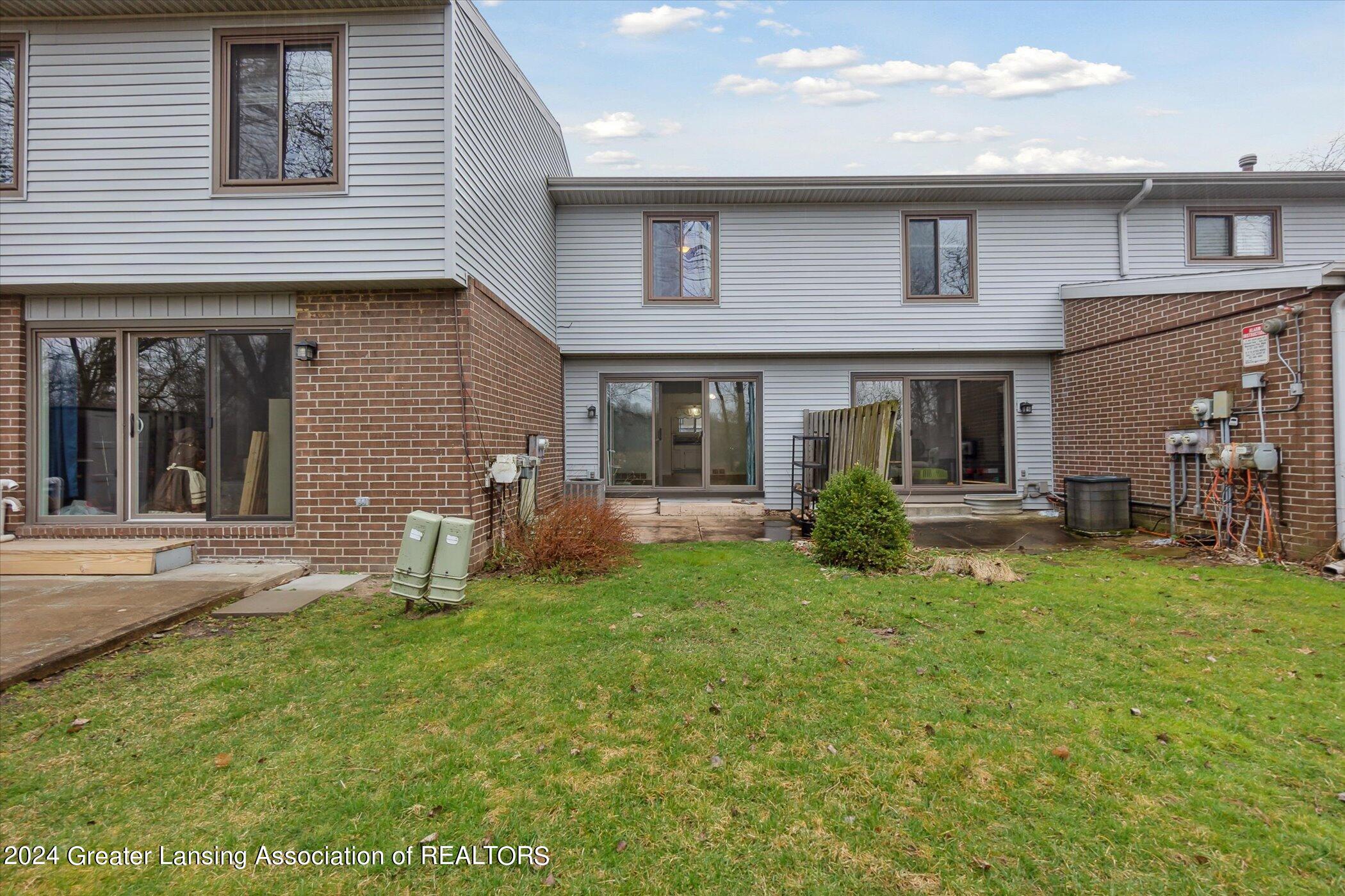 1750 Maple Ridge Road Haslett, MI 48840 - Photo 35 of 39 Rear