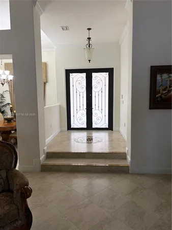 a view of entryway with a front door