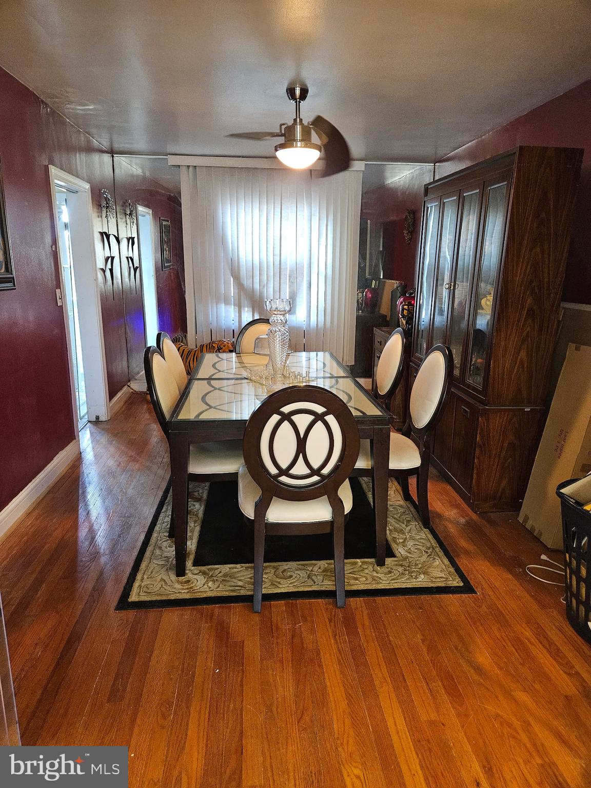 3915 Ednor Road Baltimore, MD 21218 - Photo 7 of 10 a view of a room with furniture and wooden floor