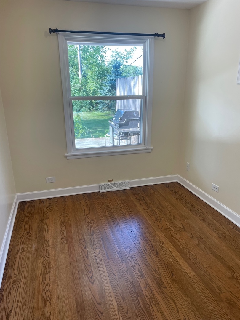 28561 West High Road Ingleside, IL 60041 - Photo 11 of 19 a view of a room with wooden floor and window