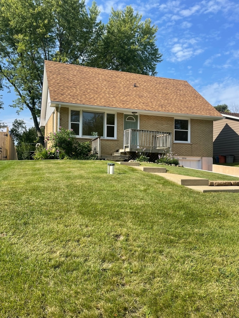 28561 West High Road Ingleside, IL 60041 - Photo 2 of 19 a backyard of a house with table and chairs