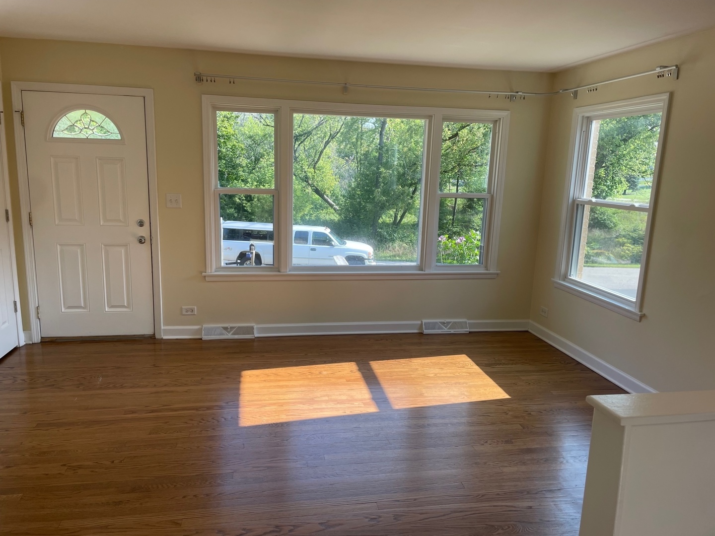 28561 West High Road Ingleside, IL 60041 - Photo 9 of 19 a view of empty room with wooden floor and fan