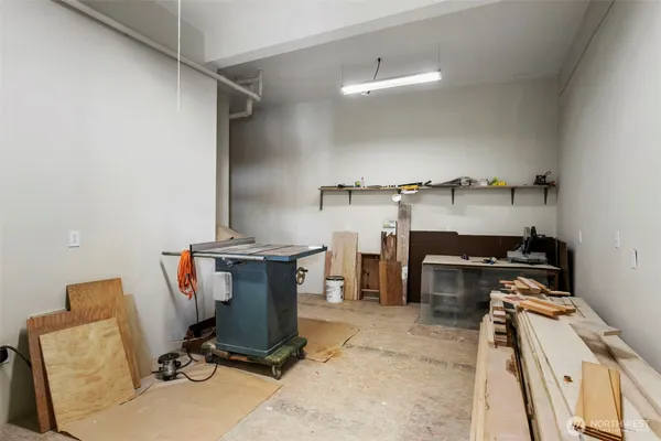 a view of a workspace with furniture