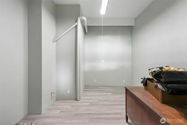 a view of a livingroom with wooden floor