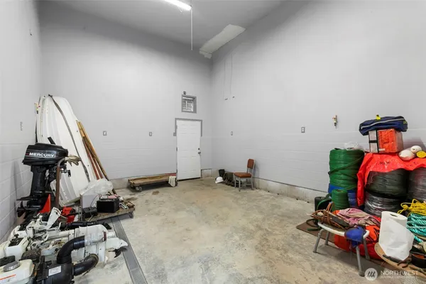 a workspace with wooden floor and furniture