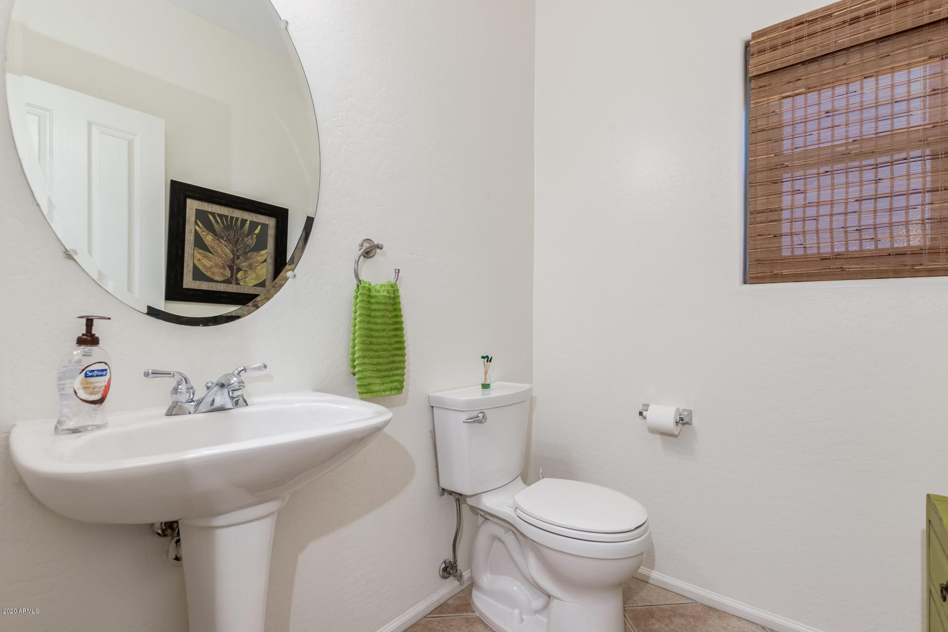 4549 East Ruffian Road Gilbert, AZ 85297 - Photo 24 of 52 a bathroom with a toilet sink and mirror