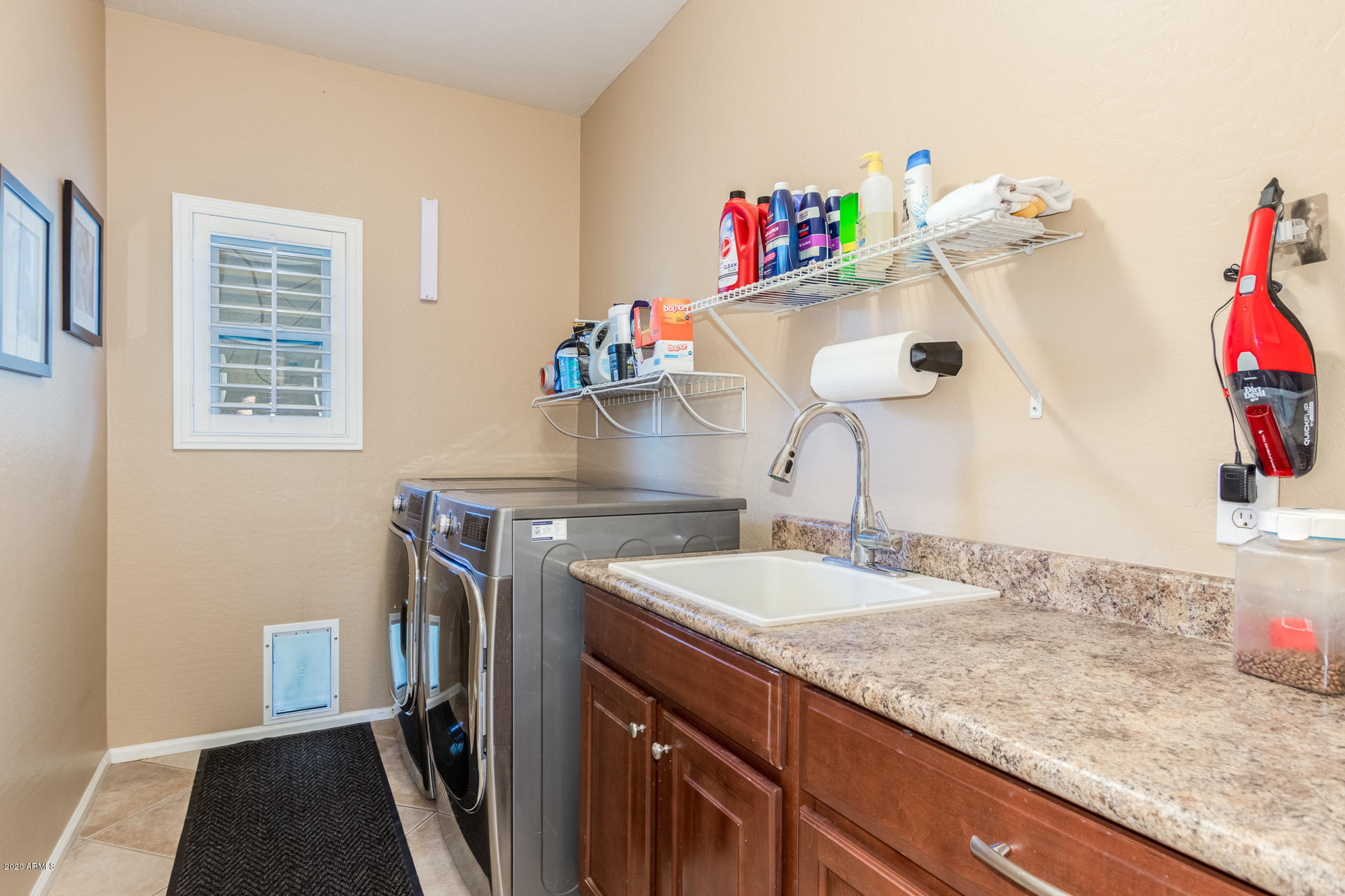 4549 East Ruffian Road Gilbert, AZ 85297 - Photo 25 of 52 a bathroom with a sink and a mirror