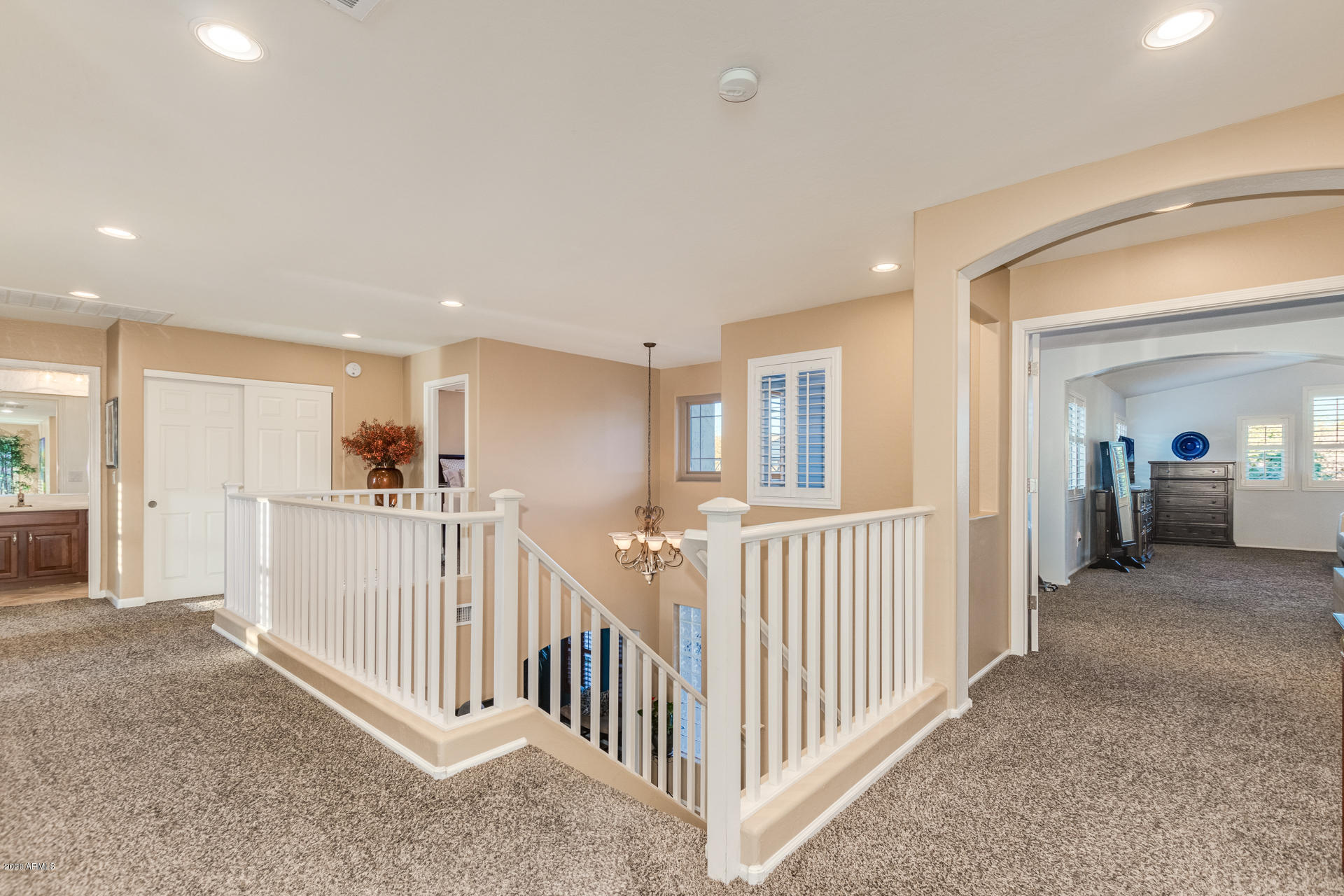 4549 East Ruffian Road Gilbert, AZ 85297 - Photo 29 of 52 a view of a hallway with a livingroom view