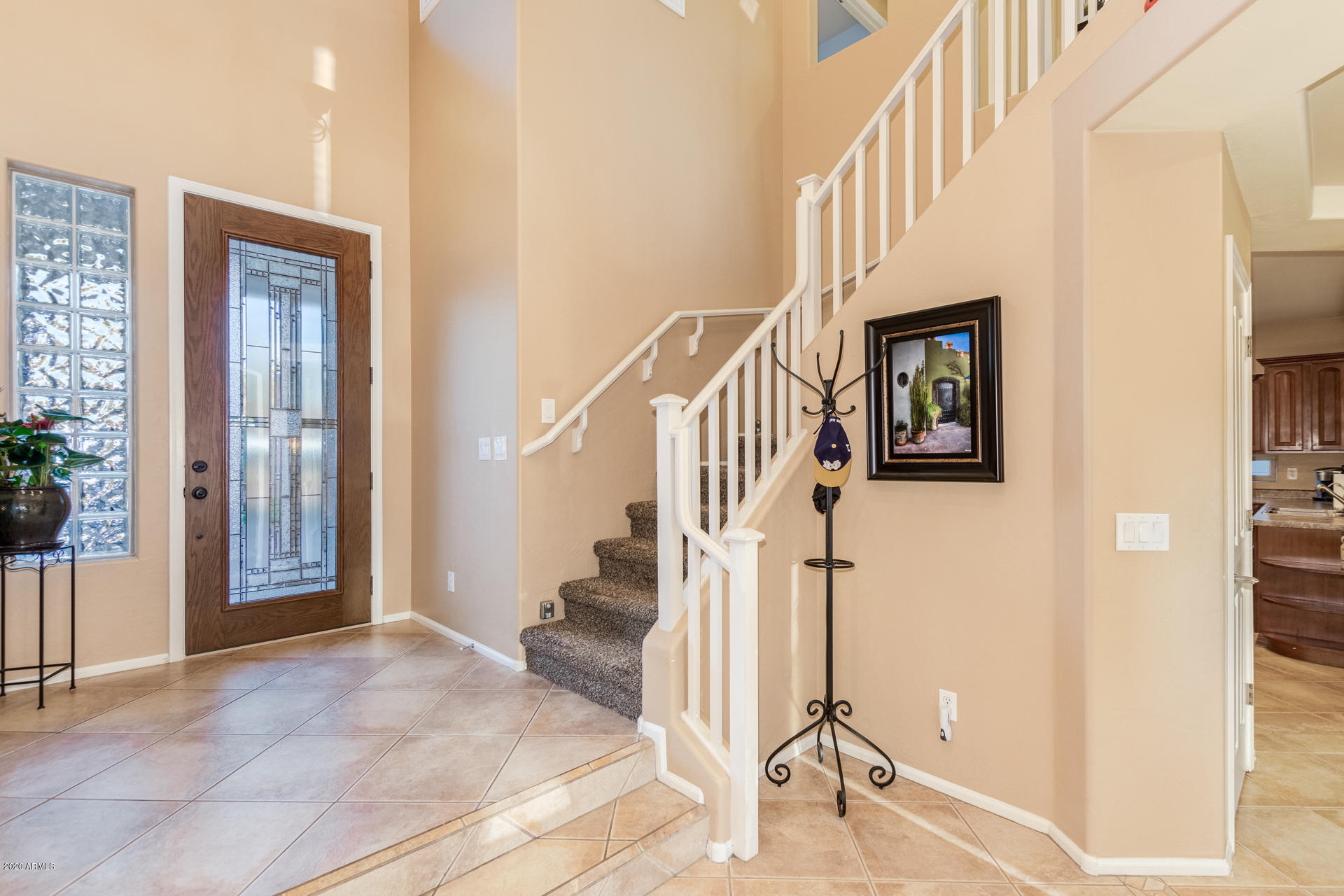 4549 East Ruffian Road Gilbert, AZ 85297 - Photo 3 of 52 a view of an entryway with staircase