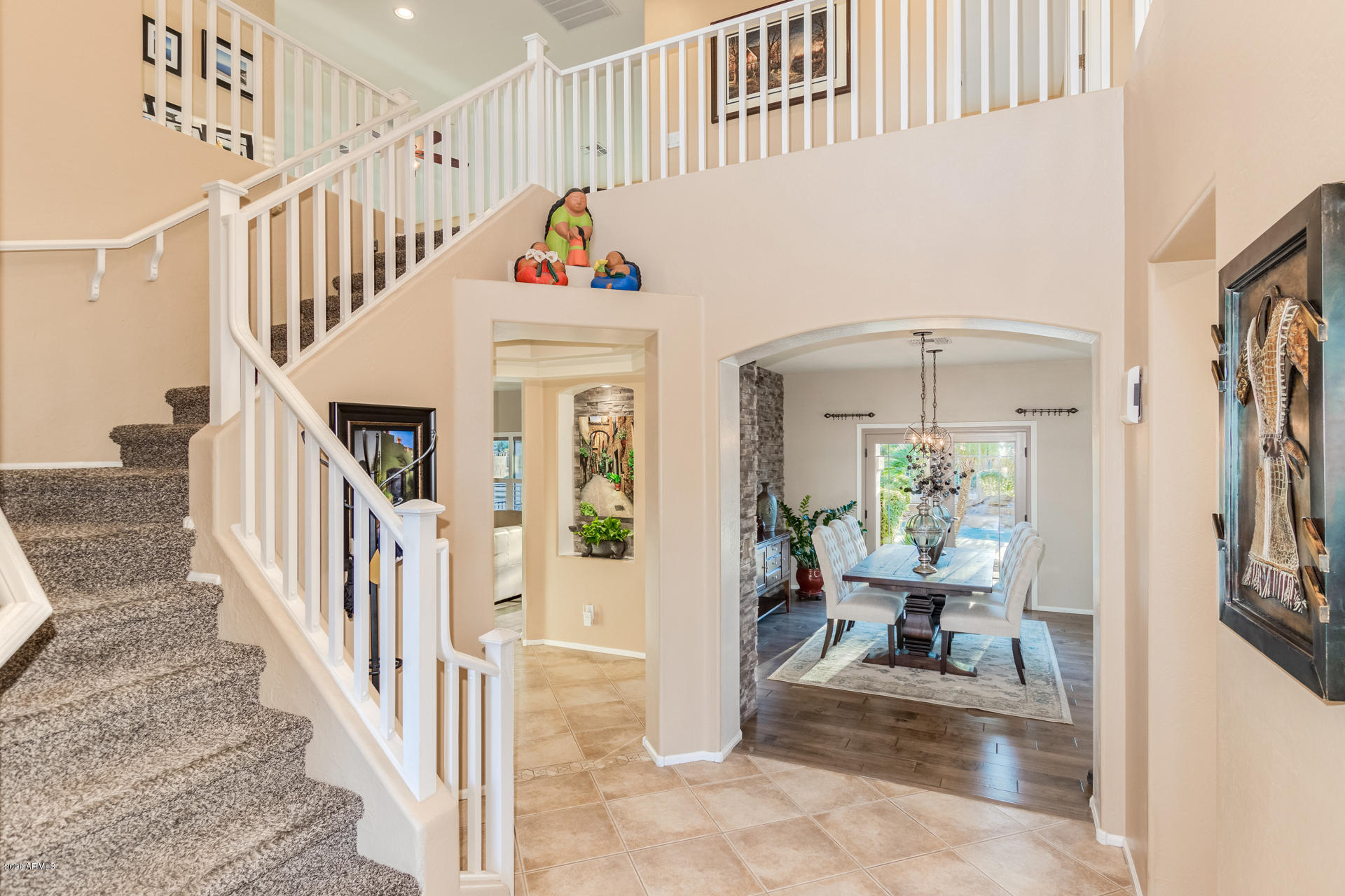 4549 East Ruffian Road Gilbert, AZ 85297 - Photo 4 of 52 a view of entryway livingroom and hall