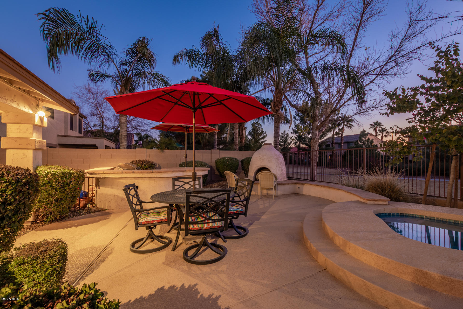 4549 East Ruffian Road Gilbert, AZ 85297 - Photo 46 of 52 a view of a backyard with sitting area and furniture