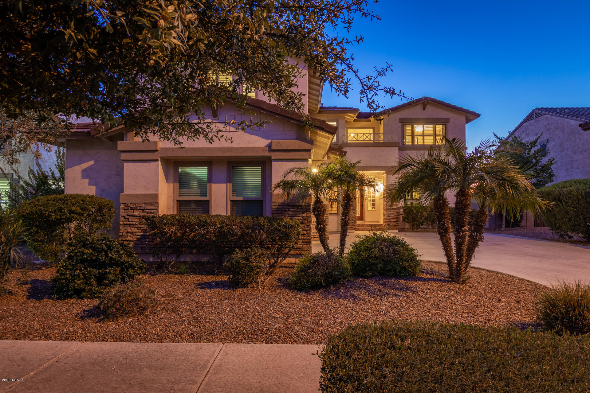 4549 East Ruffian Road Gilbert, AZ 85297 - Photo 51 of 52 a front view of a house with a yard