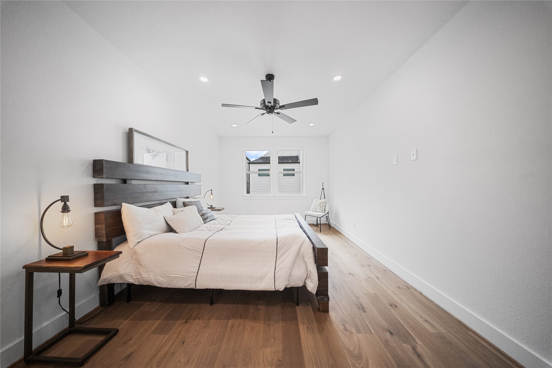 1122 Hogan Street Houston, TX 77009 - Photo 11 of 32 a bedroom with bed and window